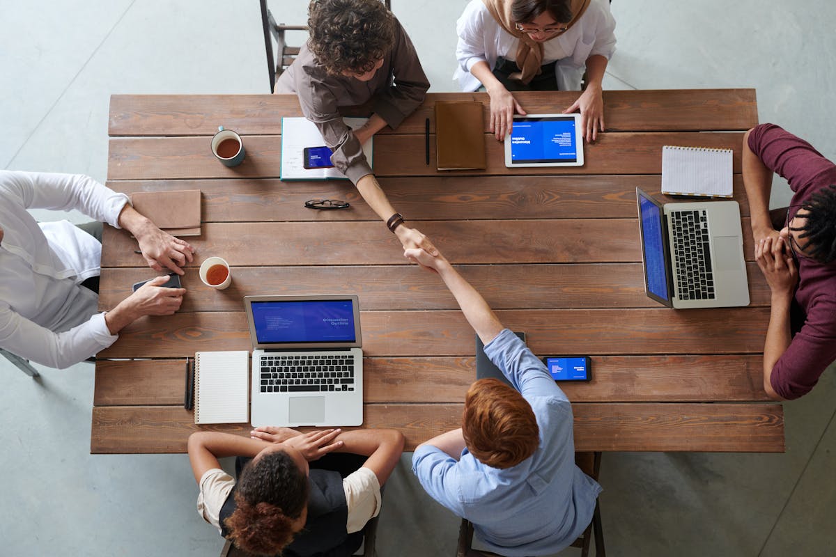 Project managers and Scrum masters using AI for team collaboration and ROI optimization